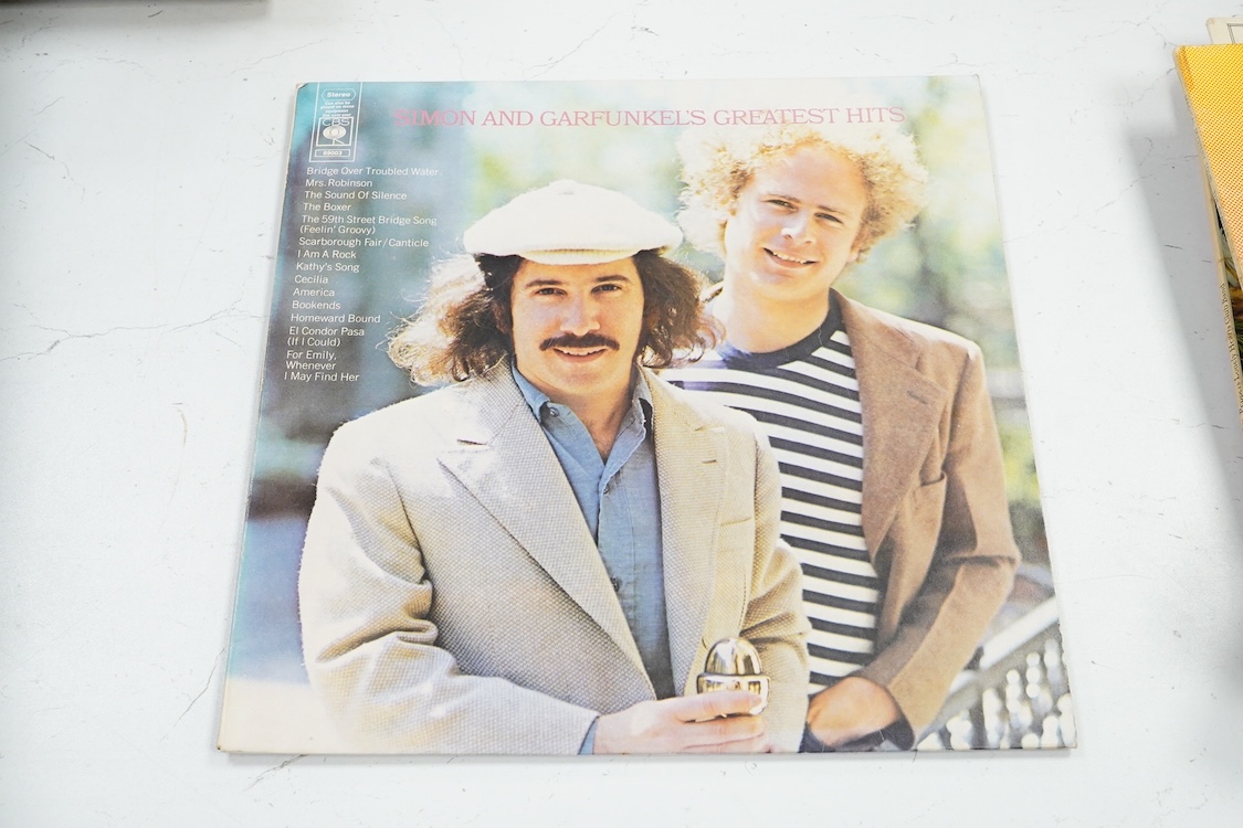 Fourteen LP record albums including eleven The Beatles and related; Sgt. Pepper’s Lonely Hearts Club Band (plus an additional three others), The Beatles at the Hollywood Bowl, Magical Mystery Tour, Revolver, etc., plus t